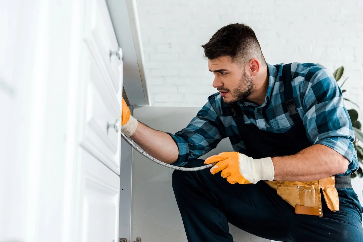 Handyman Fixing Kitchen Sink